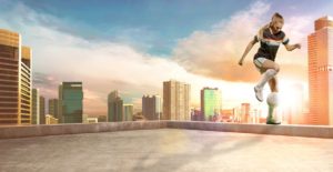 photo studio shoot of girl footballer player on edge of building